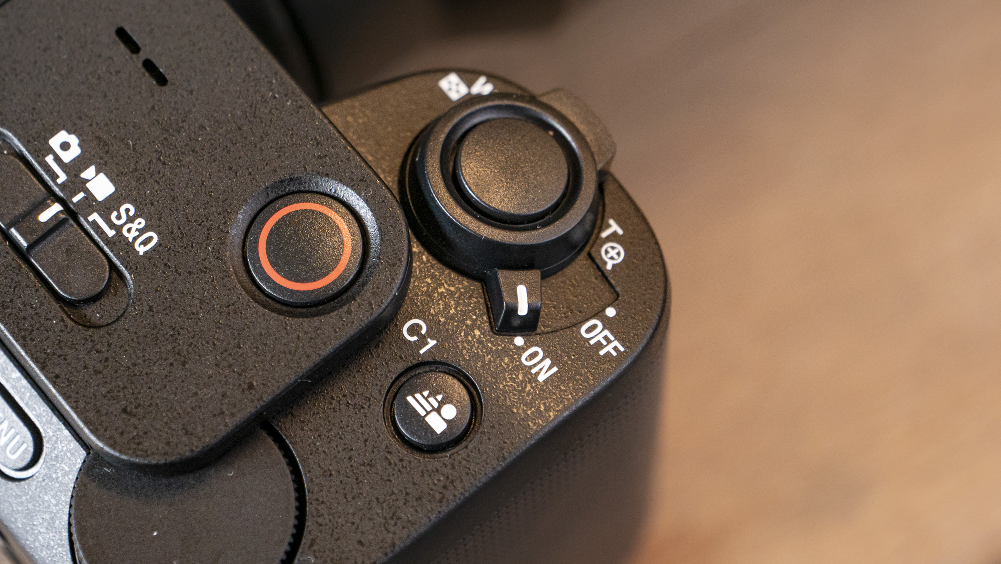 The Sony ZV-E1 camera sitting on a wooden table