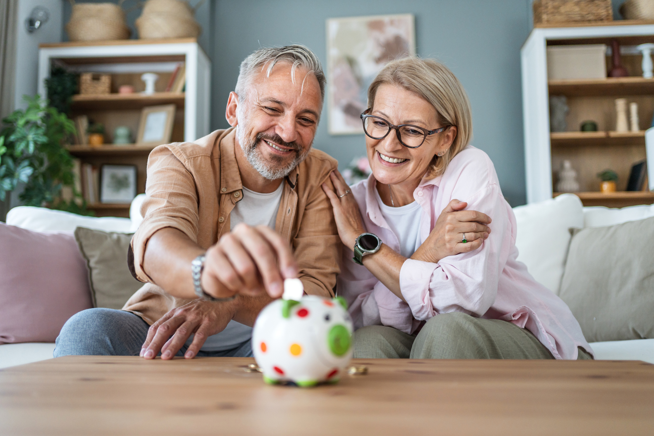 Happy couple saving for retirement