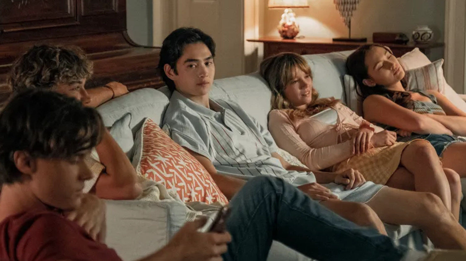 [From left] Conrad (played by Christopher Briney), Jeremiah (Gavin Casalegno), Steven (Sean Kaufman), Taylor (Rain Spencer) and Belly (Lola Tung) hanging out in &quot;The Summer I Turned Pretty&quot; s3