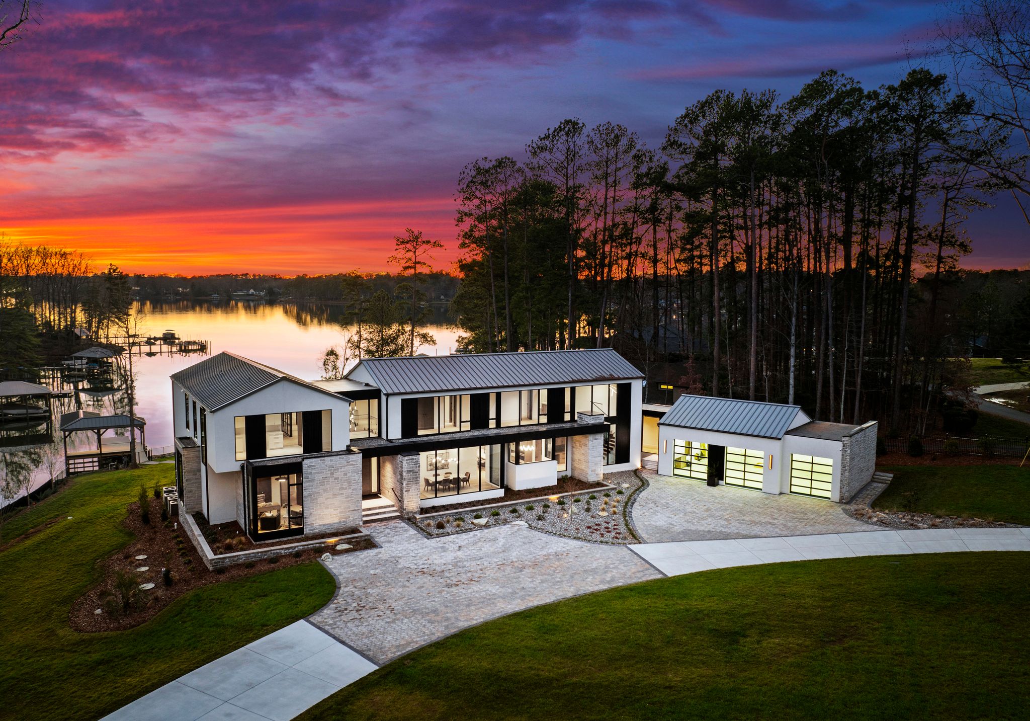 Exterior view of detached property on banks of Lake Norman