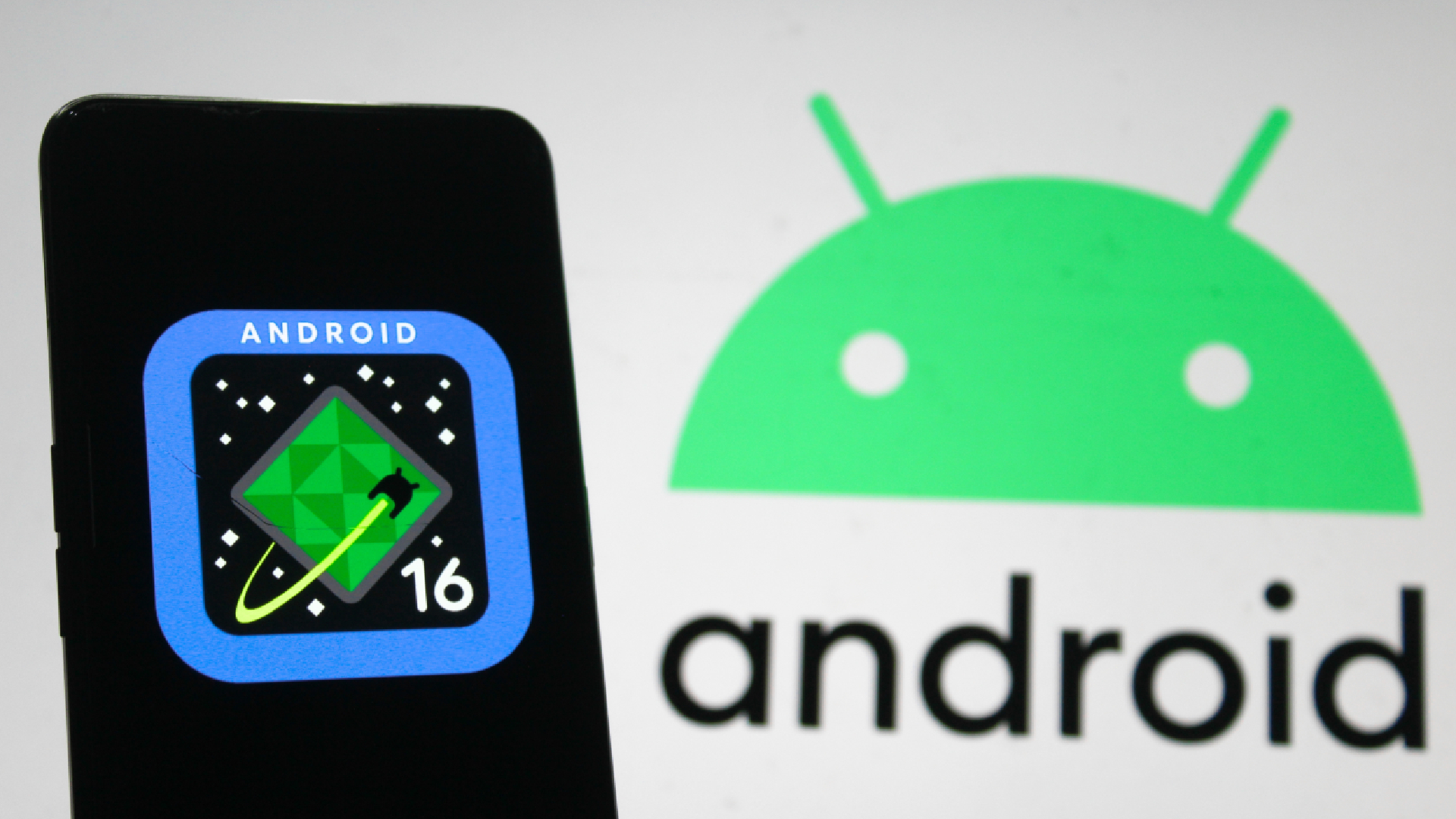 A phone sillhouette with the Android 16 logo, alongside an Android logo in the background