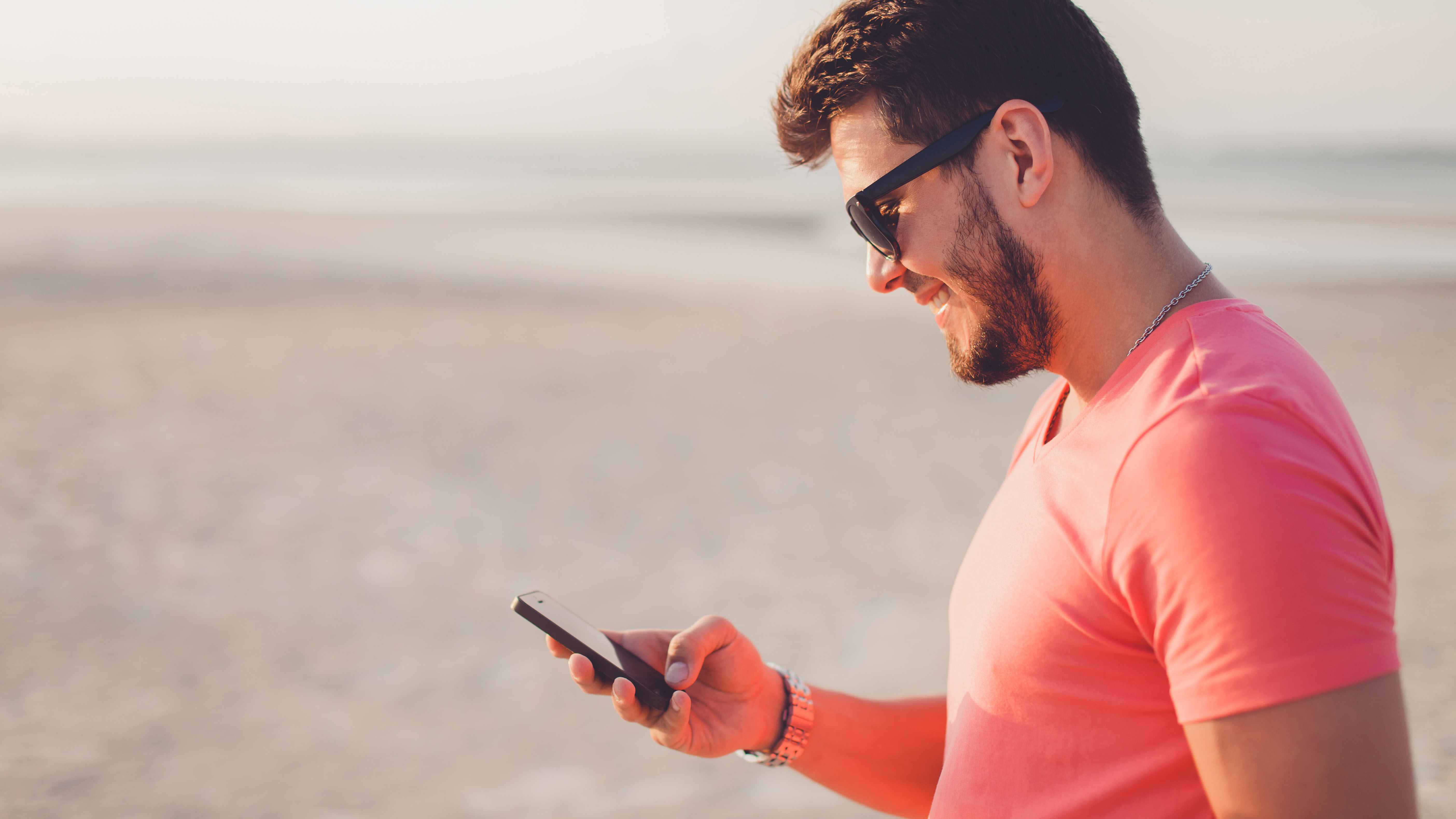Man using iPhone.