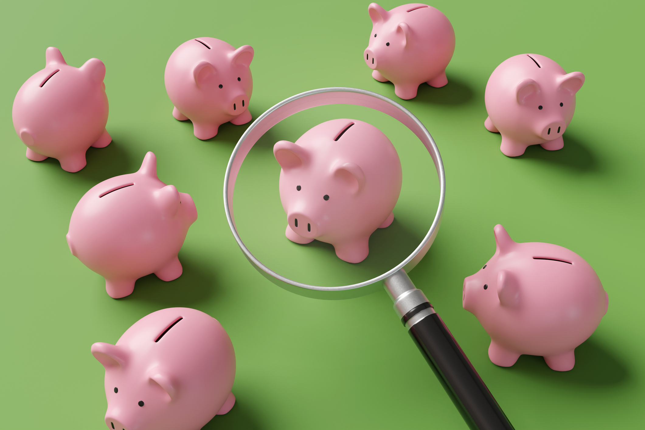 seven pink piggy banks with a magnifying glass over one and a green background