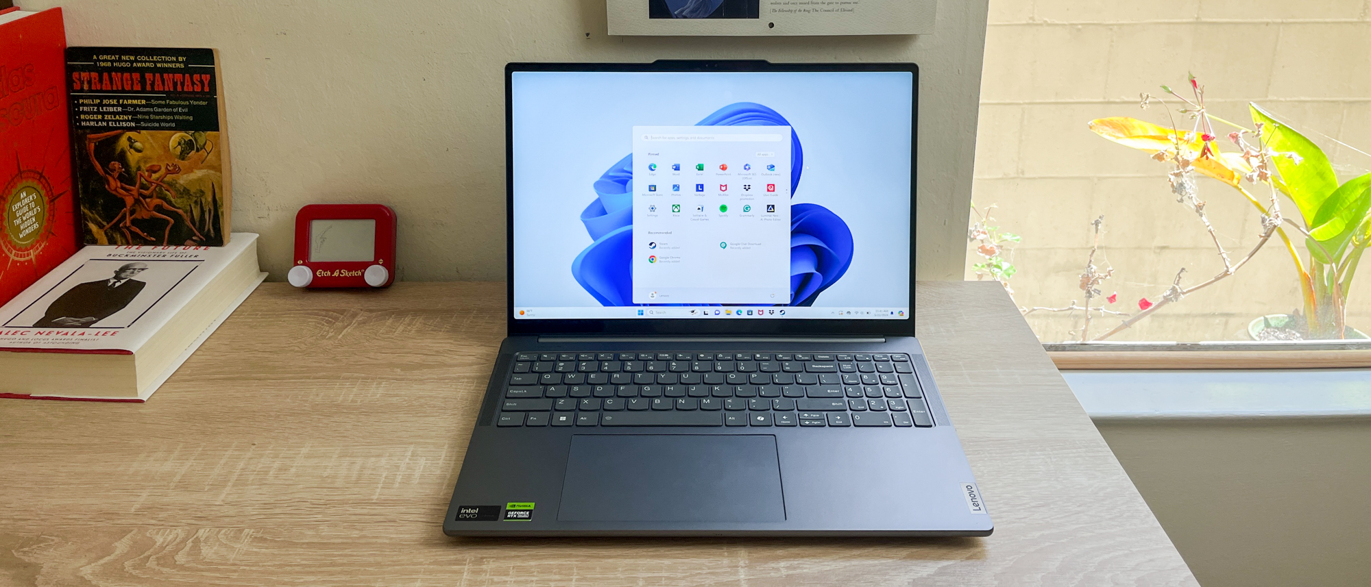 Lenovo Yoga Pro 9i review unit on a desk