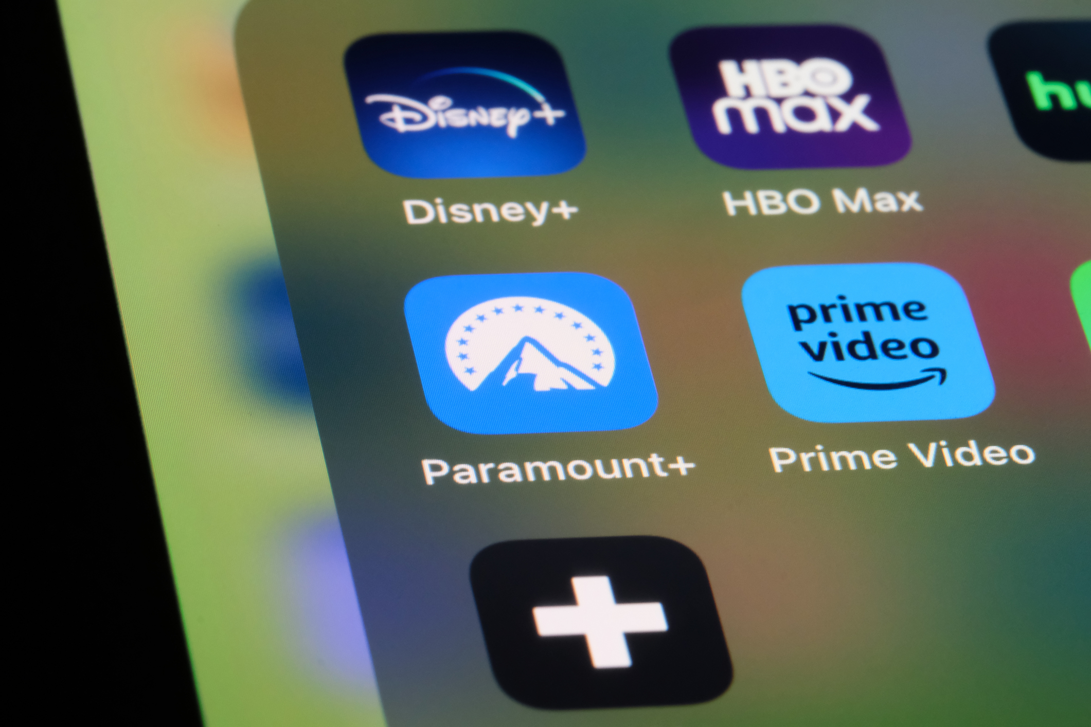 Paramount+ App icon on cell phone screen. 