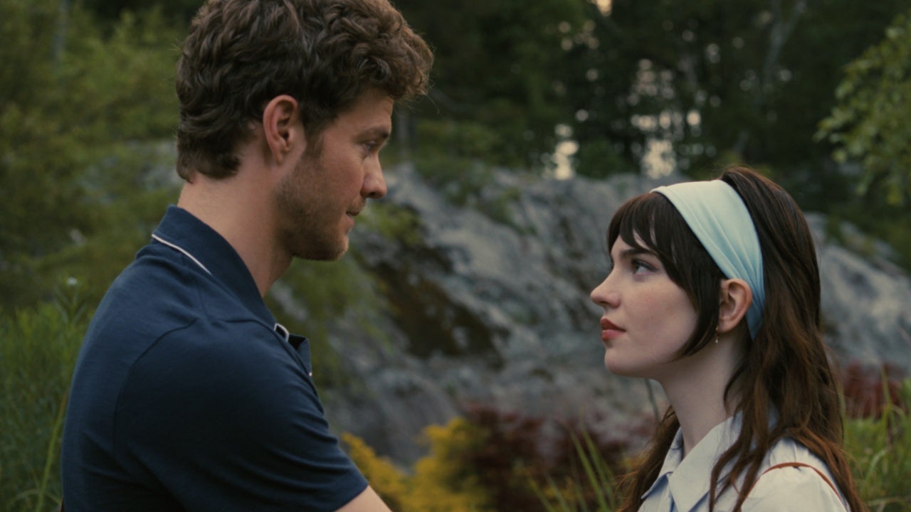 Josh and Iris staring at each other in an outdoor location in Warner Bros&#039; Companion movie